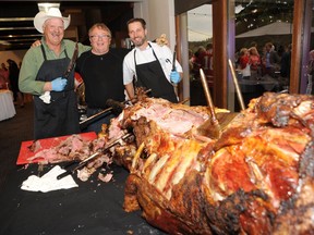 Nova hotels founder Mike Mrdjenovich, centre, with rancher Bill Anderson, left, and Royal Glenora Club executive chef Steve Busak, donated a tasty, tender bison to Pinot on the Patio Tuesday, June 13, 2017 at the Royal Glenora Club in Edmonton and was disappointed only about half of it was devoured.