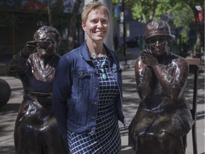 Shauna Frederick, chair of the Famous 5 Foundation, is pictured at the Women are Persons! Famous Five monument in Calgary's Olympic Plaza in June 2017.