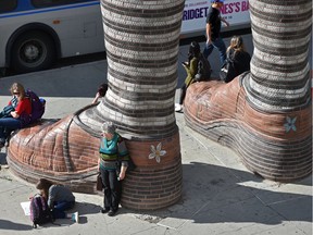 Immense Mode, a giant sculpture of a pair of shoes and stockings, has provided a resting stop for people at the transit station outside Southgate Centre since its construction in 2009.