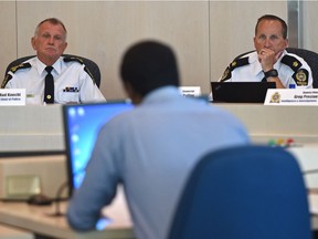 Black Lives Matter activist Bashir Mohamed speaks to the Edmonton Police Commission, including Police Chief Rod Knecht, left, at a meeting Thursday at city hall in Edmonton on Thursday, July 20, 2017.