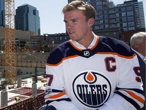 Connor McDavid looks at the under construction Ice District, following a press conference where it was announced that he has signed an eight-year contract worth $12.5-million a year with the Edmonton Oilers on July 5, 2017.
