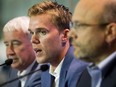 McDavid signing

Oilers Entertainment Group Vice Chair and CEO Bob Nicholson, Connor McDavid, and President of Hockey Operations & General Manager Peter Chiarelli take part in a press conference at Rogers Place, where it was announced that McDavid has signed an eight-year contract worth $12.5 million a year with the Edmonton Oilers, in Edmonton Wednesday July 5, 2017. Photo by David Bloom

Suspicious death Full Full contract in place
David Bloom, Postmedia