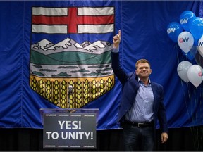 Wildrose Leader Brian Jean gives a speech after it was announced that the Wildrose party had voted in favour of uniting with the Progressive Conservatives, in Red Deer on Saturday, July 22, 2017.