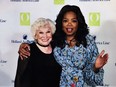 Former Edmonton fashion store owner Del Dilkie, 86, received a hug from Oprah Winfrey on an Alaska cruise.