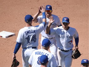 Houston Astros v Toronto Blue Jays

TORONTO, ON - JULY 8: Josh Donaldson #6 of the Toronto Blue Jays celebrates their victory with Justin Smoak #14 and Darwin Barney #18 during MLB game action against the Houston Astros at Rogers Centre on July 8, 2017 in Toronto, Canada. (Photo by Tom Szczerbowski/Getty Images)

No more than 7 images from any single MLB game, workout, activity or event may be used (including online and on apps) while that game, activity or event is in progress.
Tom Szczerbowski, Getty Images