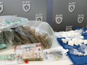 The Alberta Law Enforcement Response Team recently raided two homes near Winterburn road, seizing a quantity of drugs, cash and a firearm. One person has been charged.