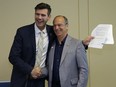 Edmonton Mayor Don Iveson (left) and Leduc County Mayor John Whaley (right) swere all smiles last week after signing an annexation agreement at Edmonton International Airport between the city and the county.