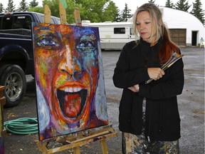 Artist Chris Riley had her vehicle stolen from the driveway (behind her) on the acreage where she lives near Spruce Grove. In the vehicle was artwork which she had just finished displaying at the Whyte Avenue Art Walk in Edmonton. The theft occurred in the early morning hours on Monday, July 10, 2017.