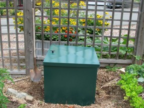 A compost bin breaks down household waste into compost, which can benefit your garden by improving soil health and boosting drought resistance.