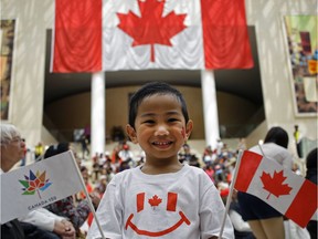 Yuan Dimla, 3, was all smiles during Canada Day at Edmonton's city hall on July 1, 2017.