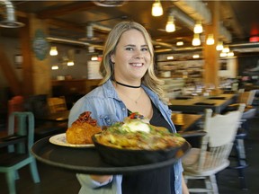 General manager Shawn Haynes displays some of the brunch dishes available at Beaumont's Chartier restaurant. It is one of 30 restaurants selected for the long list of Canada's Best New Restaurants 2017.