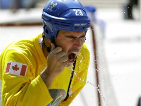 Street performer Paz cools off with some help from the audience at the 2017 Edmonton International Street Performers Festival in Churchill Square on July 13, 2017.