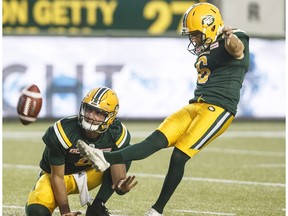 Edmonton Eskimos' Sean Whyte (6) makes the field goal as Danny O'Brien (9) places the ball, against the Ottawa RedBlacks during second half CFL action in Edmonton, Alta., on Friday July 14, 2017.