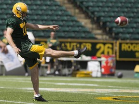 Edmonton Eskimo Hugh O'Neill practices at Commonwealth Stadium.