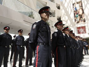 Members of Recruit Training Class 140 help celebrate the Edmonton Police Service's 125th anniversary in June.