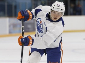 Ostap Safin shoots the puck during  Edmonton Oilers development camp in Jasper, Alta., on July 5, 2017. Photo: Ian Kucerak/Postmedia

Full Full contract in place
Ian Kucerak, Postmedia