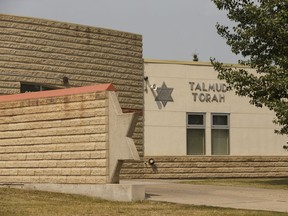 Police investigating dumpster fire outside of an Edmonton Jewish school that may have been deliberately set

Edmonton police are investigating after fire damaged a recycling bin outside of Talmud Torah School on Saturday in Edmonton, as seen on Sunday, July 16, 2017. Ian Kucerak / Postmedia

Full Full contract in place
Ian Kucerak, Postmedia