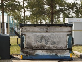 Edmonton police were investigating after fire damaged a recycling bin, shown on July 16, 2017 outside of Talmud Torah School in Edmonton.