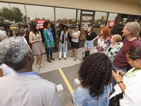 Members of Black Lives Matter demonstrate outside of a meeting between Edmonton Police Service Chief Rod Knecht and community members regarding carding, or random street checks, in Edmonton on Wednesday, July 19, 2017.