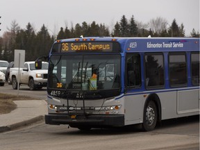 An Edmonton Transit System bus runs through congrested rush hour traffic at the intersection of Terwillegar Drive and 40 Avenue in Edmonton on Friday, March 24, 2017.