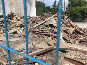 Rubble is all that remains of a Terrace Heights apartment building destroyed in a fire Monday in Edmonton. The building, at 101 Avenue and 73 Street, was torn down to control the blaze.