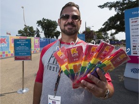 Warren Becker, Chair, Edmonton Pride Festival Society sells pride socks on Friday July 28, 2017 as K-Days is holding its first event partnering with the Edmonton Pride Festival Society.