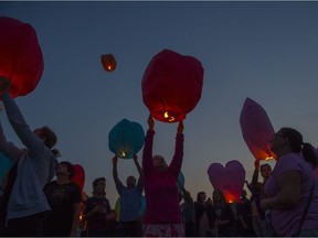 About 50 Chinese lanterns were released into the night sky Sunday, July 30, 2017 as a  tribute to Khrystyna Maksymova who drowned in a drainage pond in the north Edmonton community of Chrystallina Nera while trying to save the dog she was walking on July 22, 2017.