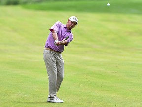 Hank Lebioda hits his approach on the fifteenth hole during the final round of the Mackenzie Investments Open at Club de Golf Les Quatre Domaines on July 23, 2017 in Mirabel, Quebec, Canada.  (Photo by Minas Panagiotakis/Getty Images)