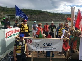 Journal columnist Nick Lees, and members of the CASA Foundation, float down the North Saskatchewan River in the 58th annual annual sourdough raft race in Edmonton, AB on Sunday, July 23, 2017.