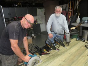 Gordon Lair, left, and Roger Kehoe built a raft in 12 hours this weekend they hope will help return the Sourdough Raft Race on the North Saskatchewan River to its former glory when as many as 200 rafts took part and several thousands people lined the banks to watch.