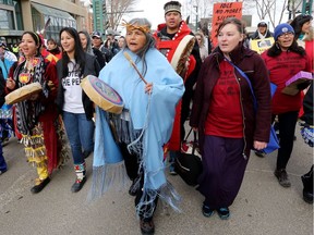 Participants march from the Shaw Conference Centre down Jasper Avenue following the closing ceremonies of the seventh and final Truth and Reconciliation Commission event in Edmonton in 2014.