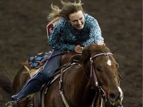 Sydney Daines (Red Deer County, AB) during the third go round of the Ladies Barrel Racing competition at the Canadian Finals Rodeo at Rexall Place, in Edmonton Alta., on Friday Nov. 7, 2014.