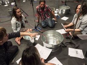 Participants rehearsing "in memoriam..." include (clockwise from left): Alex Waterman, Malaya Bishop, Kris Harper and Jessie Short.