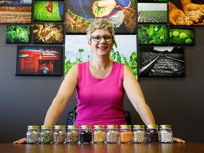 Debra McLennan, food and nutrition co-ordinator and registered dietitian at Alberta Pulse Growers, with some of the different foods that are collectively known as pulses.