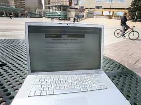 A computer taps into free Wi-Fi at a public hotspot in Churchill Square.