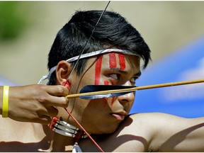 Landon Sasakamoose from the Ahtahkakoop Cree Nation in Saskatchewan takes aim in the bow and arrow competition at the 2017 World Indigenous Nations Games. The event was held on the Enoch Cree Nation reserve west of Edmonton on Monday July 3, 2017.