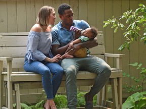 Julia and Jesse Lipscombe enjoy some quiet time with their son, Indy.
