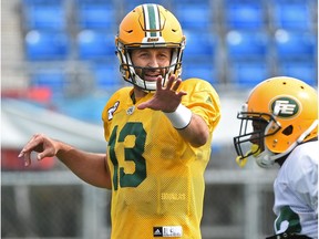 Edmonton Eskimos quarterback Mike Reilly gestures to a receiver during practice at Clarke Stadium in Edmonton, August 14, 2017.