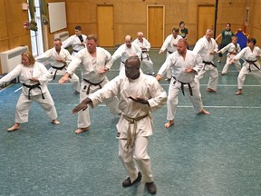 A karate group is training non-stop for 24 hours straight to raise food/money for the University of Alberta Food Bank, at the Aberhart Centre Gym in Edmonton, August 25, 2017.
