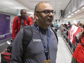 Head coach Roy Rana arrives at Toronto&#039;s Pearson Airport with other members of Canada&#039;s under-19 Basketball team after winning gold at the U19 FIBA World Cup, in Toronto on Monday, July 10, 2017. Rana has been named head coach of Canada&#039;s men&#039;s basketball team for the upcoming FIBA Americup 2017 and Canada&#039;s first World Cup 2019 qualifying matches. THE CANADIAN PRESS/Chris Young