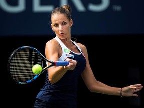 Karolina Pliskova of the Czech Republic returns the ball against Naomi Osaka of Japan during women&#039;s third round Rogers Cup tennis action in Toronto on Thursday, August 10, 2017. THE CANADIAN PRESS/Nathan Denette