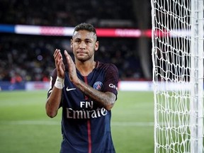 PSG&#039;s Neymar applauds with supporters after the French League One soccer match between PSG and Toulouse at the Parc des Princes stadium in Paris, France, Sunday, Aug. 20, 2017. (AP Photo/Kamil Zihnioglu)