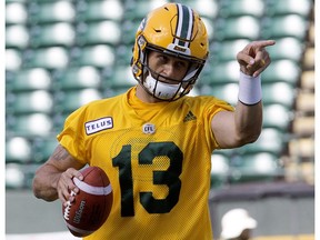 Mike Reilly takes part in an Edmonton Eskimos team practice at Commonwealth Stadium, in Edmonton Wednesday Aug. 2, 2017.