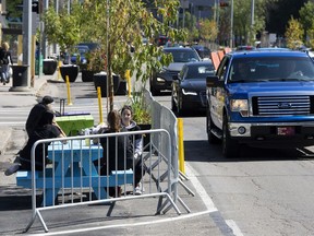 Imagine Jasper Avenue

People enjoy a parklet along Jasper Avenue near 113 Street, set up as part of the Experience Jasper Avenue Design Demo, in Edmonton Tuesday Aug. 8, 2017. The Experience Jasper Avenue Design Demo, which includes pop-up parks, murals, trees and landscaping, runs until Oct. 31 along Jasper Avenue between 109 street and 115 Street. Photo by David Bloom

Imagine Jasper Avenue Full Full contract in place
David Bloom, Postmedia