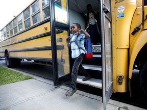 Students arrive for the first day of school at St. Teresa of Calcutta School, 9008 105A Ave., in Edmonton Monday Aug. 14, 2017. Approximately 330 students were expected to return to the year-round school Monday morning.