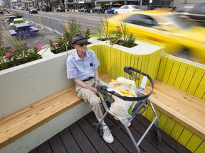 David Hazlett, 95, sits in a pop-up park along Jasper Avenue near 111 Street on Wednesday Aug. 23, 2017. The park is part of the Experience Jasper Avenue pilot project, which includes pop-up parks, murals, trees and landscaping, along Jasper Avenue between 109 Street and 115 Street. Hazlett lives  nearby and says the safety improvements are welcome.