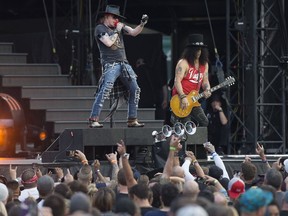 Axl Rose, Slash and Guns N' Roses perform at Commonwealth Stadium, in Edmonton Wednesday Aug. 30, 2017.