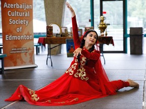 Sabrina Camp with the Azerbaijan Cultural Society of Edmonton performs a traditional dance during the Heritage Festival press conference at Hawrelak Park in Edmonton on Tuesday, Aug. 1, 2017.