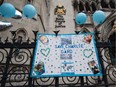 A banner is hung on a fence as supporters of of terminally ill baby Charlie Gard protest outside the High Court after the verdict was announced on July 24, 2017 in London, England. The five-month legal battle over Charlie Gard's future treatment ended after a US neurologist said that it was now too late to give him treatment.