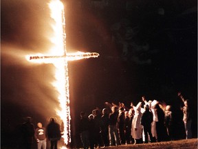 Aryan Nations burned a cross in Provost, Alta. in 1990. Alberta's far-right extremist groups past and present are under the microscope after the violent white supremacist demonstration in Charlottesville, Va.